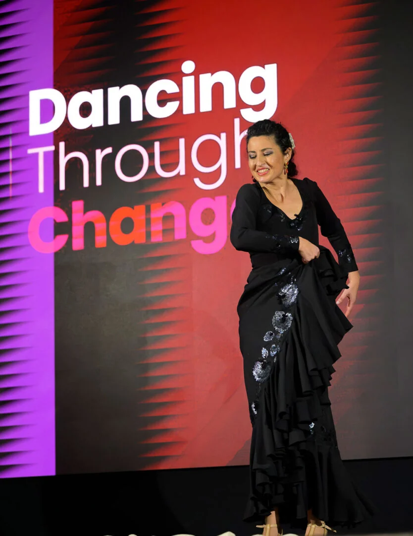 Portrait of a keynote speaker and flamenco dancer