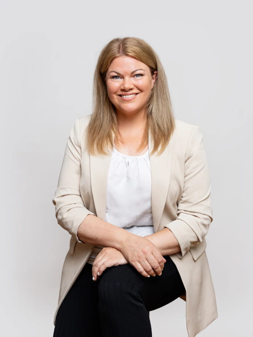 Portrait of Jennifer seated, smiling